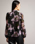 THEERA-Tops-Introducing the stunning THEERA blouse, a masterpiece of texture and print. Its textured fabric and photographic floral print are a feast for the eyes, while the stand collar with a keyhole cut-out add a touch of intrigue. With button fastening and delicate ladder lace inserts, this blouse will capture attention wherever you go. Textured blouse Photographic floral print Stand collar with keyhole cut-out Button fastening Ladder lace inserts Blouson sleeves Lined body- Ted Baker Romania